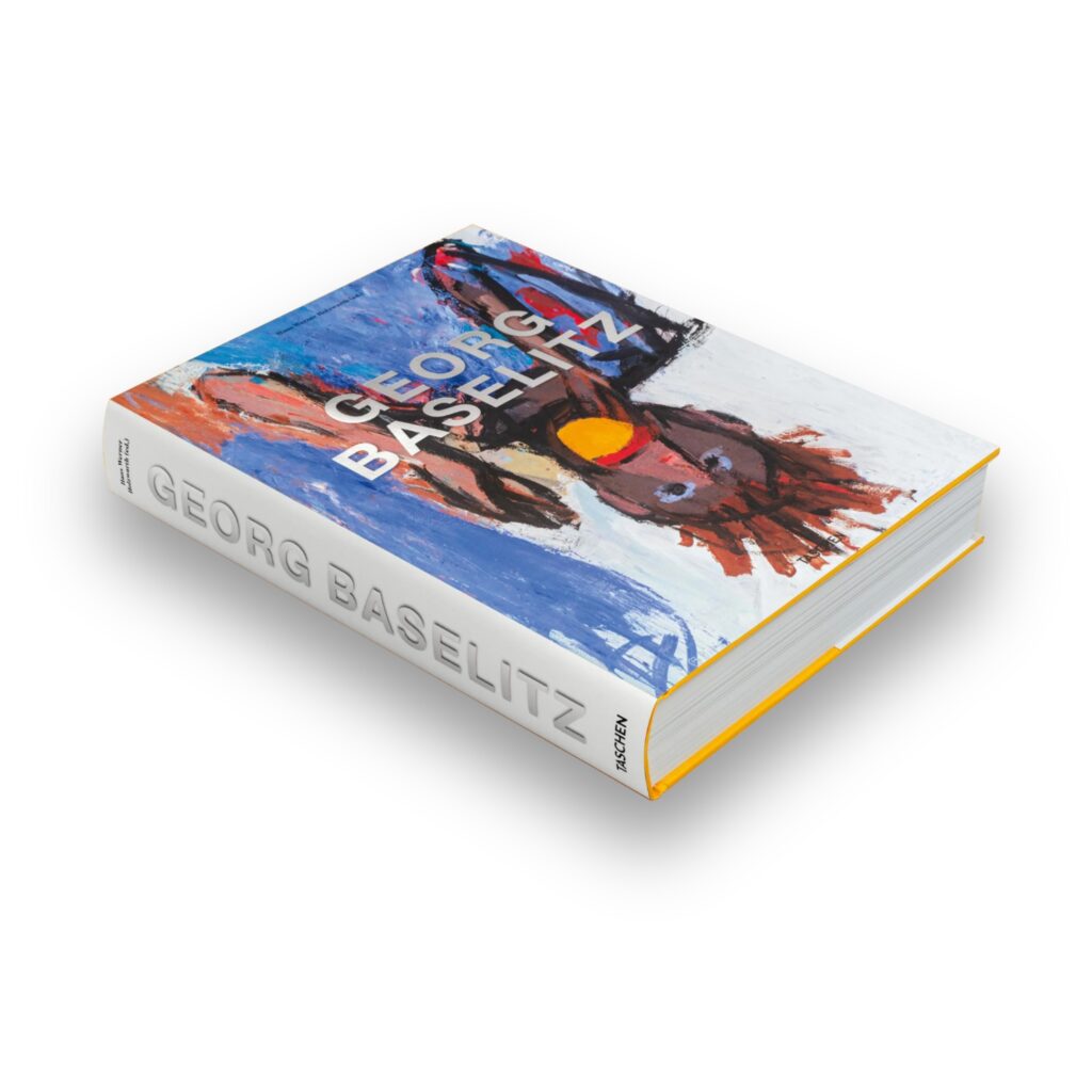 Cover of Georg Baselitz by Taschen, a large-format art monograph featuring over 400 works from the German artist, including paintings, sculptures, and drawings.